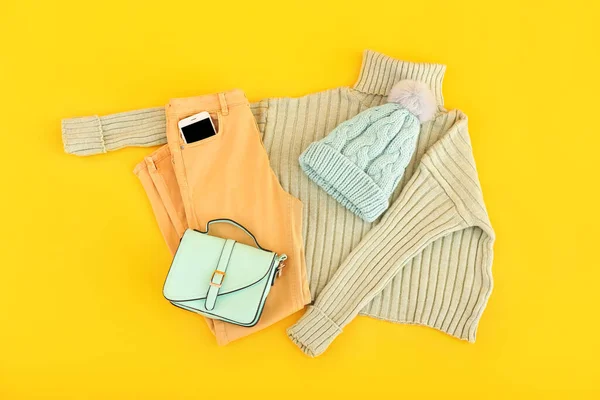 Stylish Female Clothes Mobile Phone Accessories Yellow Background — стоковое фото