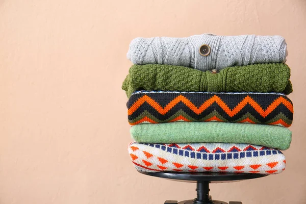 Stack Stylish Sweaters Color Background — Fotografia de Stock