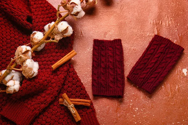 Warm Gloves Sweater Cotton Flowers Red Background — Zdjęcie stockowe
