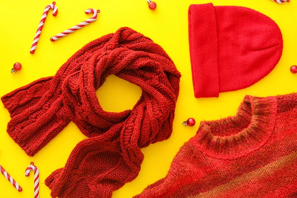 Stylish Winter Clothes Christmas Decor Yellow Background — Zdjęcie stockowe