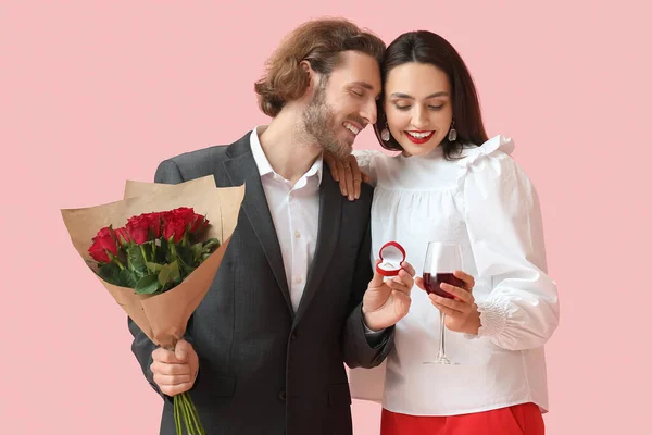 Young Man Proposing His Girlfriend Color Background Valentine Day Celebration — 스톡 사진
