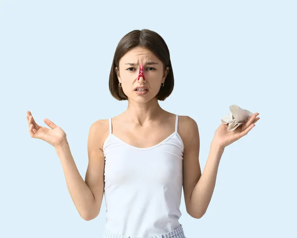 Ill Young Woman Clothespin Her Nose Light Background — 图库照片