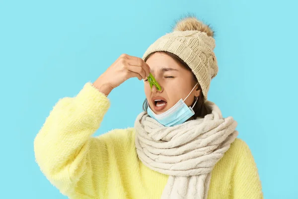 Ill Young Woman Clothespin Her Nose Color Background — 图库照片