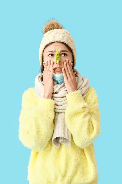 Ill Young Woman Clothespin Her Nose Color Background — Stock Photo, Image