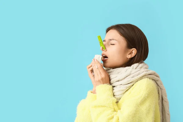 Ill Young Woman Clothespin Her Nose Color Background — 图库照片