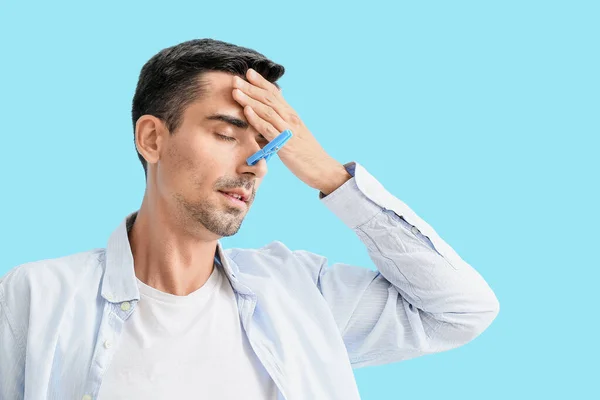 Ill Young Man Clothespin His Nose Color Background — Stock Photo, Image