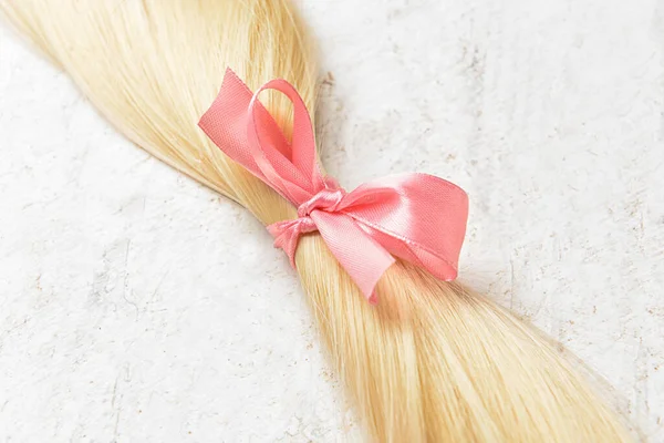 Blonde Hair Strand Donation Pink Ribbon Grunge Background Closeup — Stock Photo, Image