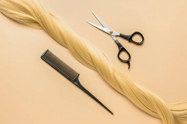 Blonde Hair Strand Donation Scissors Comb Beige Background — Stock Photo, Image