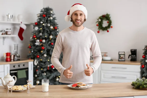 Young Man Santa Hat Showing Thumbs Plate Gingerbread Cookies Home — Stock Photo, Image