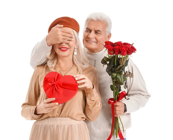 Happy Mature Couple Flowers Gift White Background Valentine Day Celebration — стоковое фото