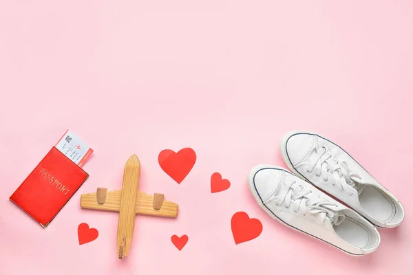 Passport Wooden Airplane Paper Hearts Sneakers Pink Background Valentine Day — Zdjęcie stockowe