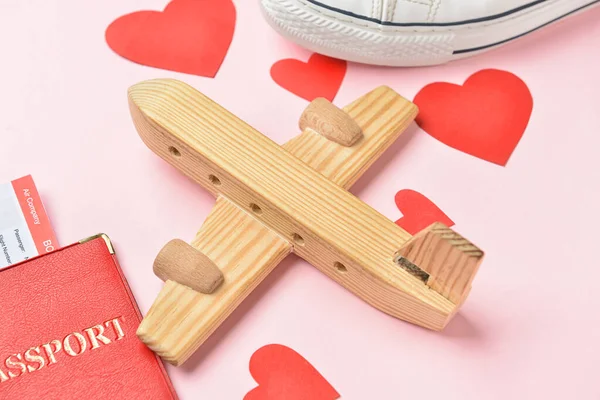 Wooden Airplane Paper Hearts Pink Background Closeup Valentine Day Celebration — Fotografia de Stock