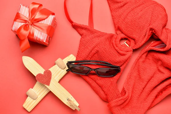 Wooden Airplane Heart Gift Sunglasses Swimsuit Red Background Valentine Day — стоковое фото