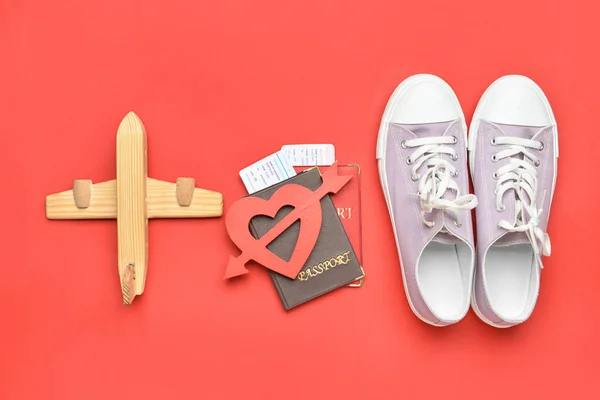 Wooden Airplane Passports Heart Sneakers Red Background Valentine Day Celebration — Fotografia de Stock