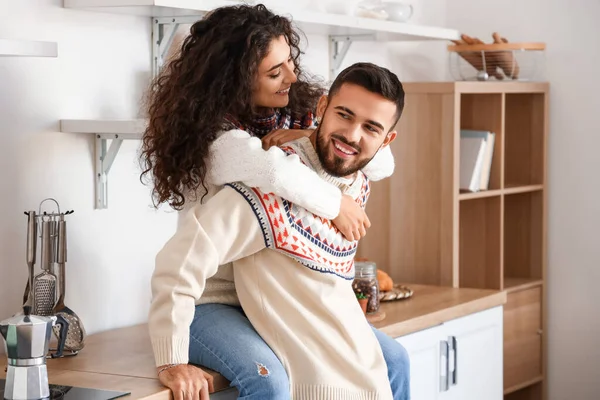 Happy Young Couple Wearing Warm Sweaters Home — Zdjęcie stockowe