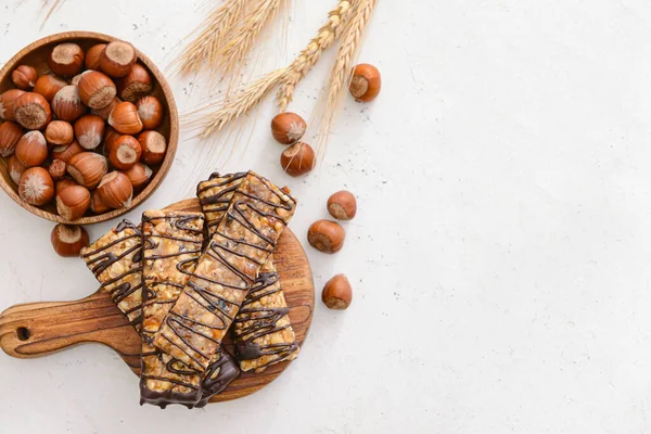 Board Tasty Chocolate Nut Bars White Background — Stock Fotó