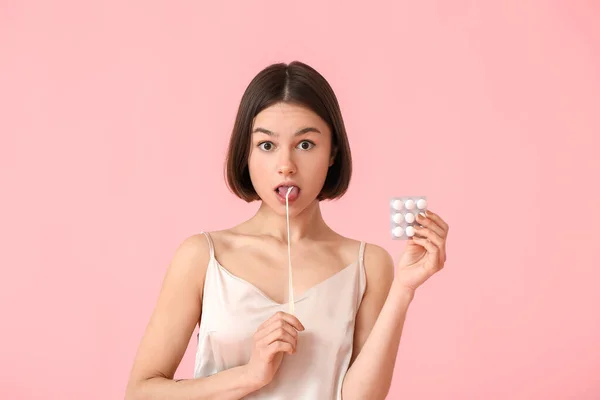 Surprised Young Woman Pajamas Chewing Gum Color Background — Stock Photo, Image