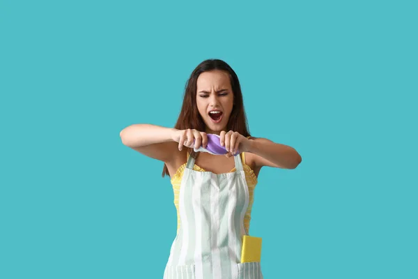 Angry Young Woman Squeezing Sponge Color Background — ストック写真