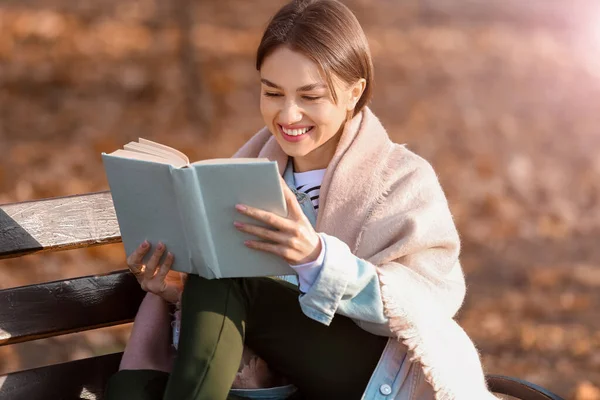 Happy Woman Plaid Reading Book Wooden Bench Park — стоковое фото