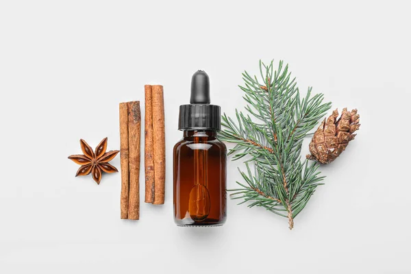 Bottle Essential Oil Spices Fir Branch Cone White Background — Stock Photo, Image