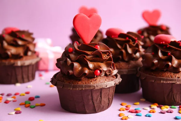 Tasty Chocolate Cupcakes Valentine Day Sprinkles Purple Background Closeup — Foto de Stock