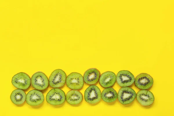 Fresh Cut Kiwi Yellow Background — Stock Photo, Image