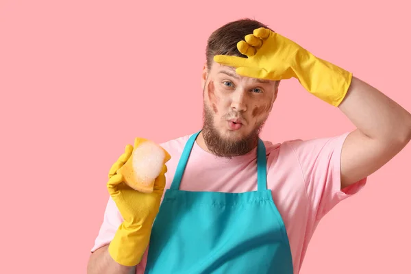 Tired Young Man Cleaning Sponge Pink Background — Fotografia de Stock