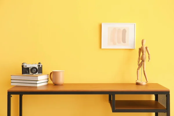 Workplace Books Cup Wooden Mannequin Doll Color Wall — Stock Photo, Image