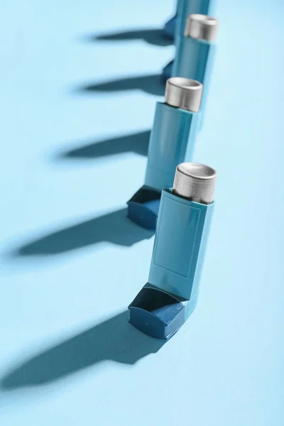 Asthma Inhalers Blue Background Closeup — Stockfoto