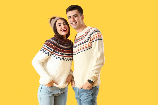 Happy Young Couple Warm Sweaters Color Background — Stockfoto