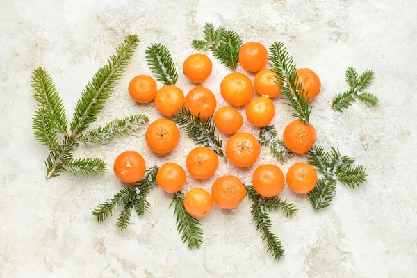 Tasty Tangerines Snow Fir Branches Light Background — Foto Stock
