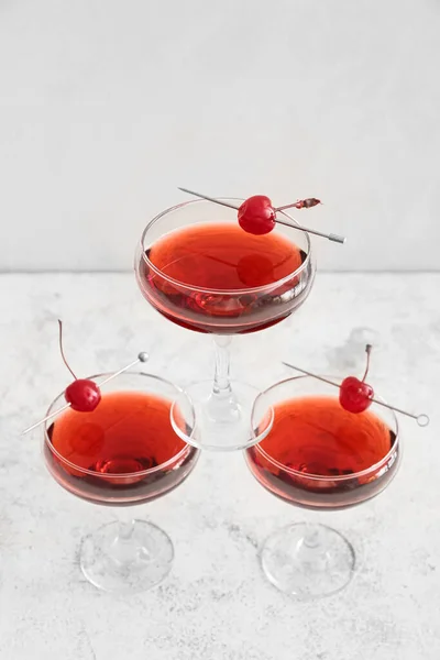 Glasses Tasty Manhattan Cocktail Cherries White Background — Foto Stock