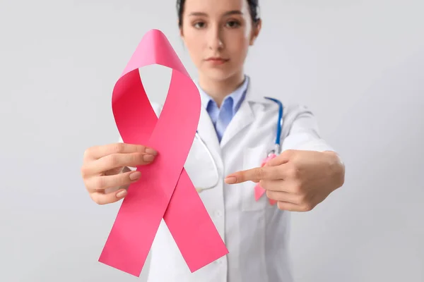 Female Oncologist Pink Ribbon Light Background Breast Cancer Awareness Concept — Stock Photo, Image