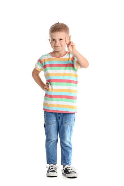 Bedårande Liten Pojke Randig Shirt Som Visar Seger Gest Vit — Stockfoto