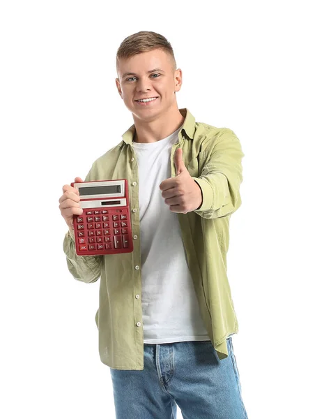 Bonito Jovem Com Calculadora Mostrando Thumb Fundo Branco — Fotografia de Stock