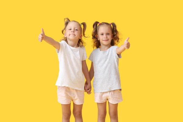 Cute Little Girls Showing Thumbs Yellow Background — Stock Photo, Image