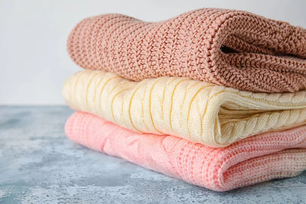 Stylish Baby Sweaters Table Closeup — Stock Photo, Image