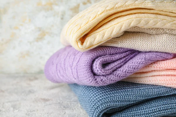 Stylish Baby Sweaters Light Background Closeup — Stock Photo, Image