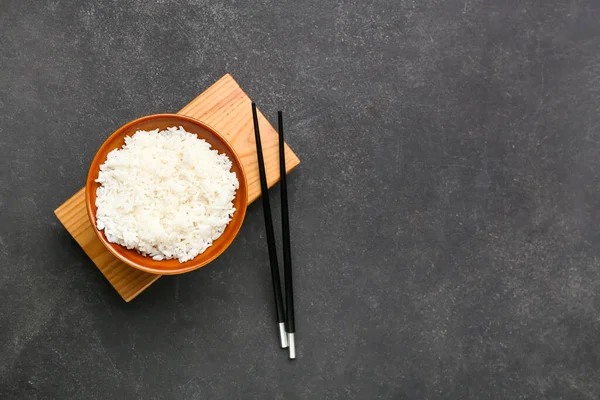 Bowl Tasty Boiled Rice Chopsticks Dark Background — Stock Photo, Image