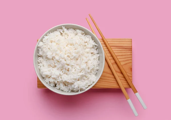 Bowl Tasty Boiled Rice Chopsticks Pink Background — Stock Photo, Image