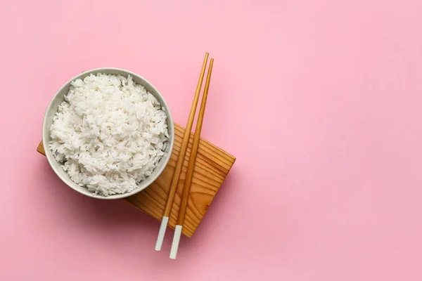 Bowl Tasty Boiled Rice Chopsticks Pink Background — Stock Photo, Image