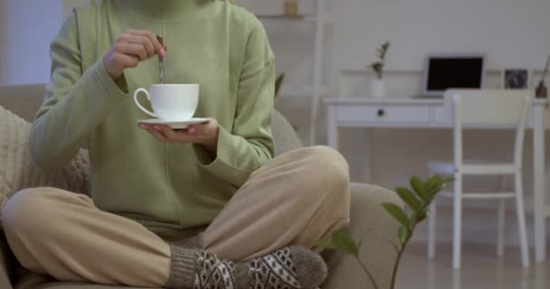 Young Woman Drinking Tasty Hot Coffee Home — Stock Video