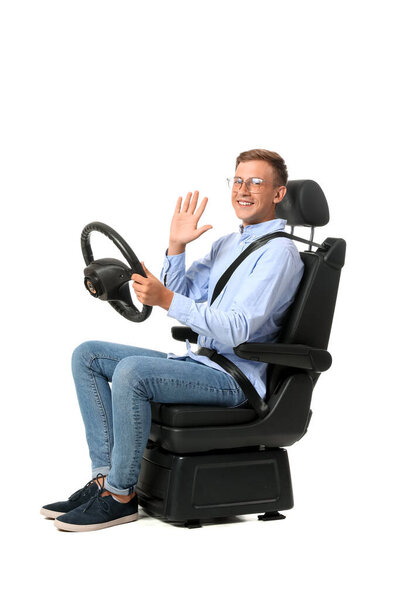 Man in car seat and with steering wheel on white background