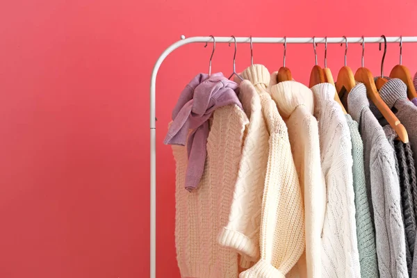 Rack Stylish Warm Sweaters Pink Wall — Stock Photo, Image