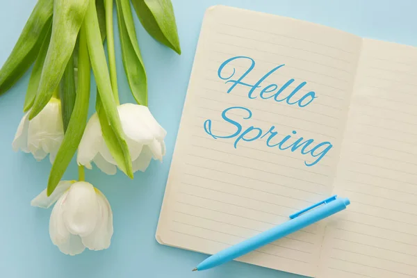 Notebook Text Hello Spring Tulip Flowers Blue Background — Stock Photo, Image