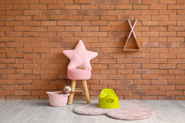 Potty Basket Toy Pouf Pillow Brick Wall — Stock Photo, Image