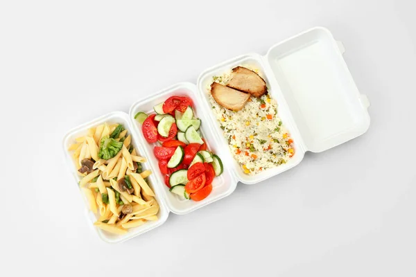 Different Delicious Food Lunch Boxes Light Background — Stock Photo, Image