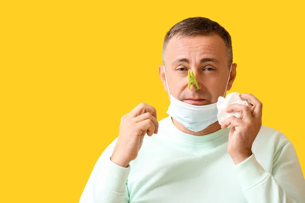 Ill Mature Man Clothespin His Nose Color Background — Stock Photo, Image