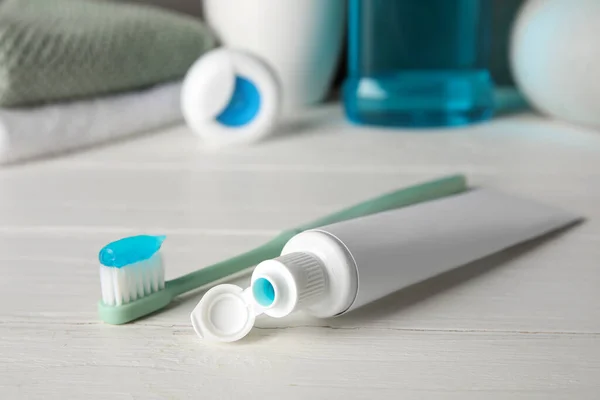 Opened Tube Toothpaste Toothbrush White Wooden Table — Stock Photo, Image