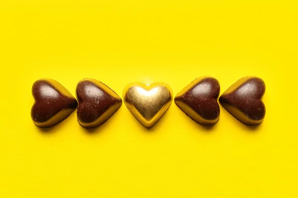 Tasty Heart Shaped Candies Yellow Background — Stock Photo, Image